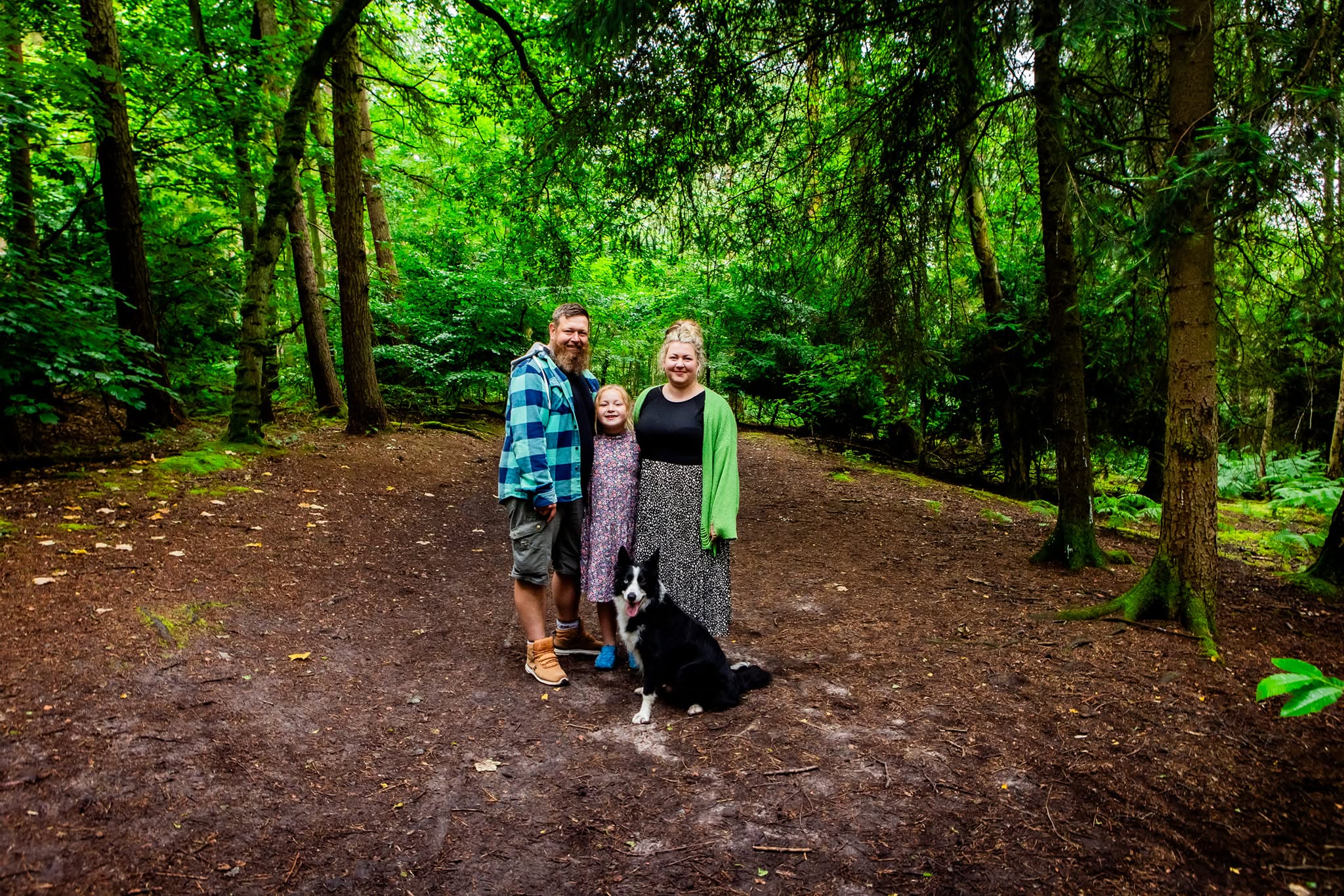 Family with their dog during a woodland shoot