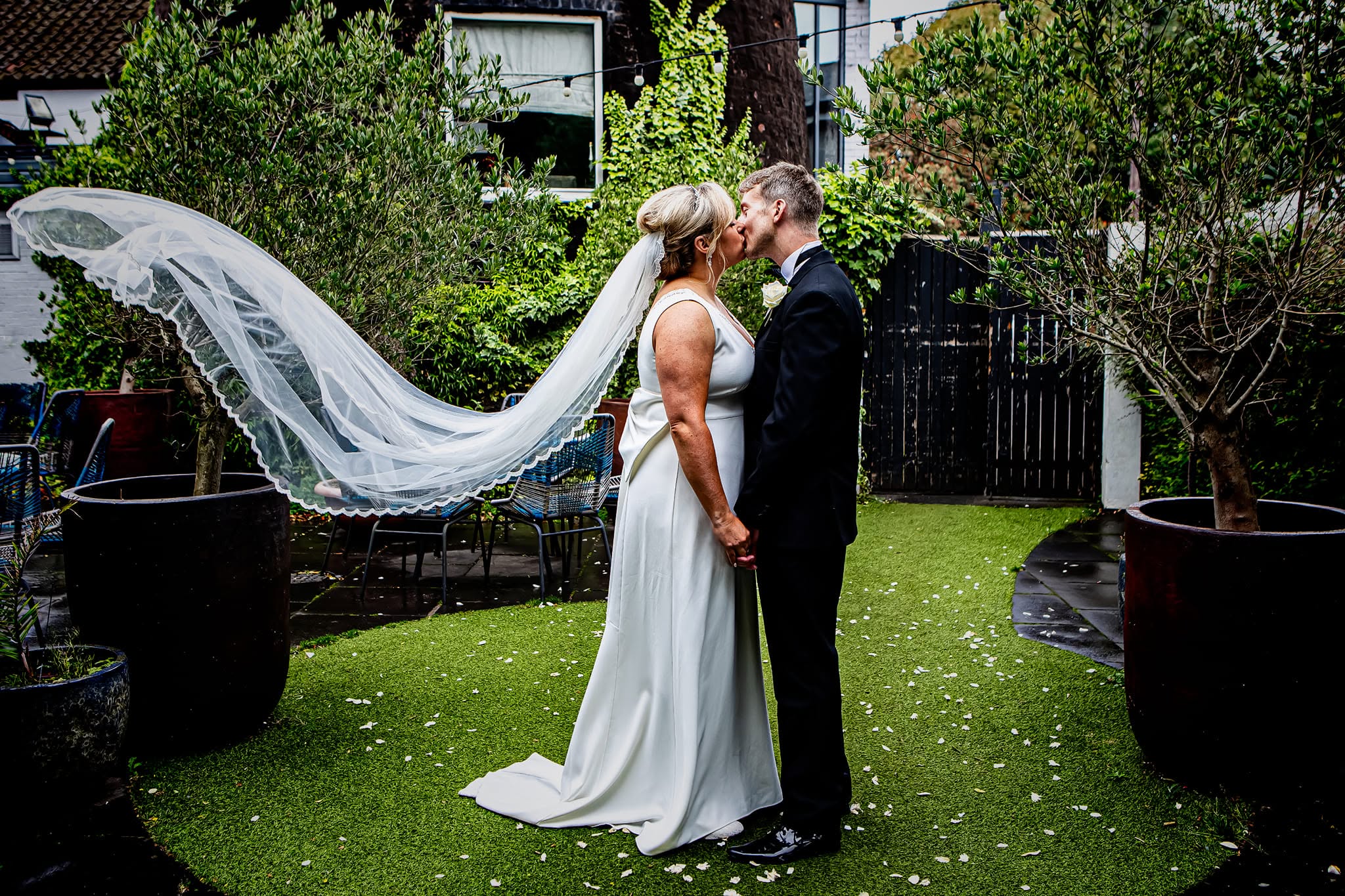 Married couple embracing after the ceremony
